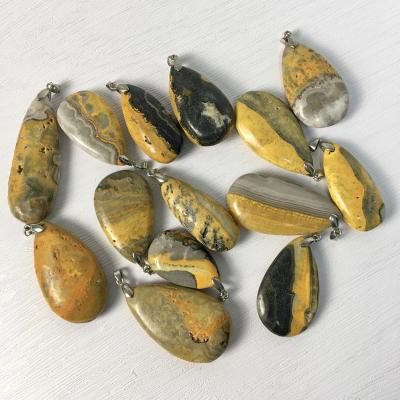 China China Wholesale Natural Gaff Bee Jasper Healing Stone Crystal Pendants for sale