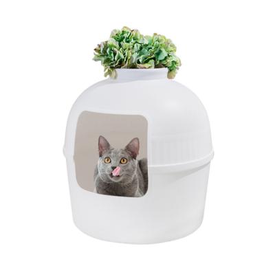 China Sustainable Port Pet Cat Litter Box Tray Plastic Biodegradable Concealed Toilet With Plant for sale