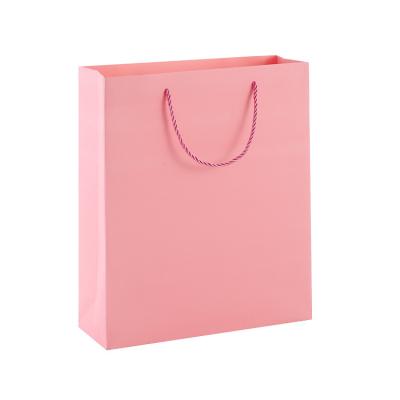 China Handmade Pink Christmas Wrapping Paper Gift Bag Custom Kraft Paper Bag Hand Held Custom. for sale