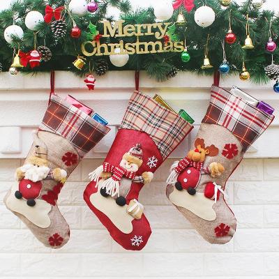 China Polyester Christmas Stocking Reindeer Snowman Christmas Hanging Stocking 3D Character Plush Canvas With Faux Fur For Christmas Decoration for sale