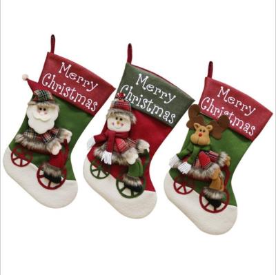 China Polyester Christmas Stocking Snowman Reindeer Christmas 3D Character Plush With Classic Faux Fur Christmas Decorations Party Props for sale