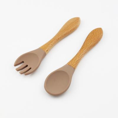 China BPA Free Organic Bamboo Safety Soft Silicone Baby Spoon And Fork for sale