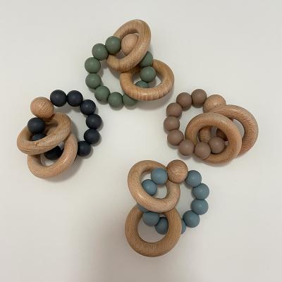 China Non-Toxic BPA Free Silicone Baby Teether Toy Wooden Teether With Beads For Babies for sale