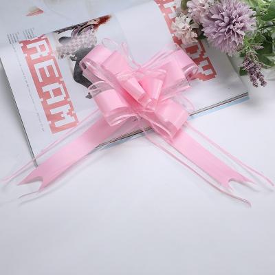 China New pp. Competitive Christmas Organza Ribbon and Bow Gift Wrap Butterfly Pattern Drawstring Pull String Ribbon Bow for sale