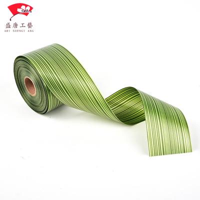 China Customize Custom High Quality PP Ribbon Green Sheet Printed Plastic Ribbon Roll For Party Christmas Decoration for sale