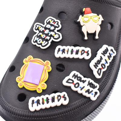 China Custom Hoop Charm Friends PVC Shoe Charms Buckles Shoe Accessories Ornaments Fit For Sandals Garden Shoes for sale