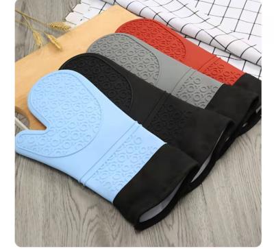 China Higher Silica Gel Double-Layer Cotton Heat Resistant Microwave Oven Barbecue Heat Resistant Gloves For Household Use for sale