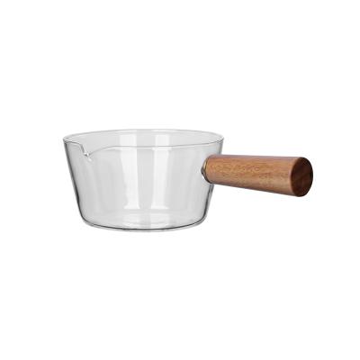 China Sustainable Household Glass Milk Pot With Wooden Handle Cooking Fruit Salad Hot Transparent Bowl Noodle Pot Glass Milk Stove Cookware for sale