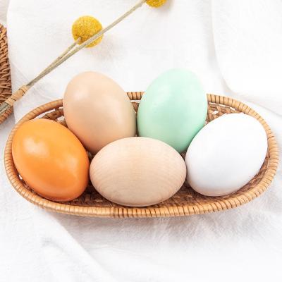 China Natural Wooden Wooden Easter Eggs Easter Toys Wooden Painted Minimalist Easter Eggs Baby Toy for sale