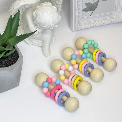 China Toy Wood Silicone Rattle Soft Toddler Toys Montessori Toys Newborn Grasping Toy for sale