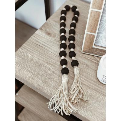 China 15mm Minimalist Home Black Wooden Tassels Home Decor Bulky Home Decor Tassels for sale