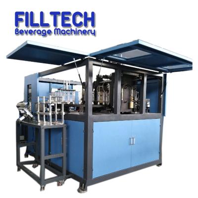 China Automatic Bottle 4 Cavity Servo Motor Juice Bottle Blow Molding Machine For Bottling System for sale