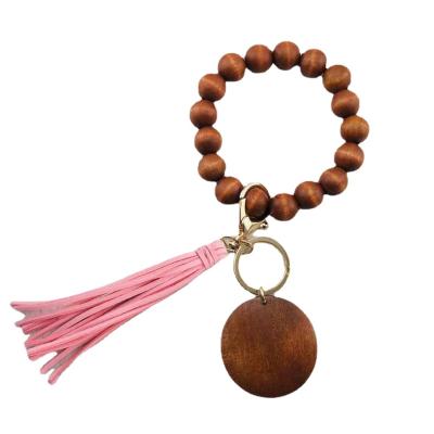 China Fanshion Customized Retro Keychain Bangle Bracelet Bead Key Chain PU Woodland Leather Tassel Bracelets for sale