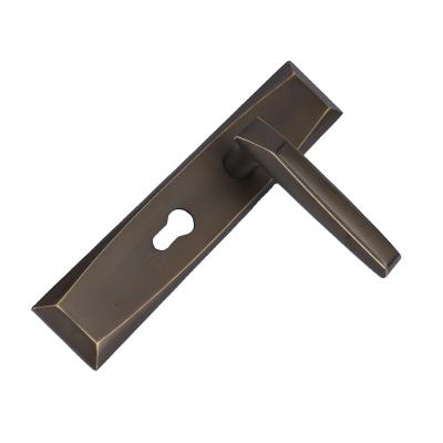 China Modern German style door lock black gold door handle lever lock wear resistant wood door handles anti theft for sale