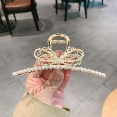 China 2022 European and American advanced butterfly fashion hair claw big grab new head clip fashion temperament flower hair clip back shar for sale