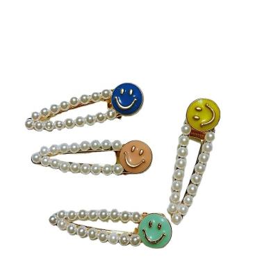 China Simple hair accessories pearl fashion platypus clip headwear girl retro Korean hollow smiley drop hairpin water hits clip accessory for sale