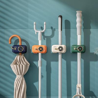 China Coastal Wall Mounted Home Bathroom Suction Rack Storage Holder Brush Broom Organizer Broom Hose Hangs Home Household Tools for sale