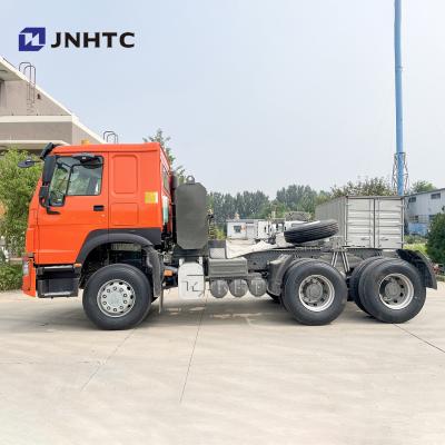 China sinotruk howo tractor truck price 371 rght engines truck in pakistan 6800x2496x3230 for sale