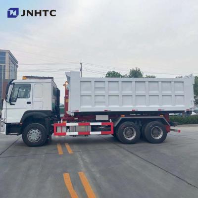 China SINOTRUK HOWO 6X4 20TONS Hotels Swing Arm Garbage Truck Used For Falling Hook Lift Trash Dump Waste Collection Truck for sale