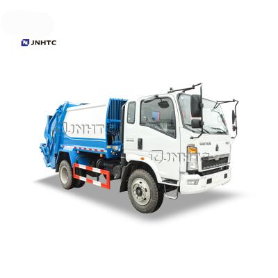 China Sinotruck Sinotruk Howo 4x2 6 Wheels Aluminum Alloy 3 Ton Compactor Garbage Truck for sale