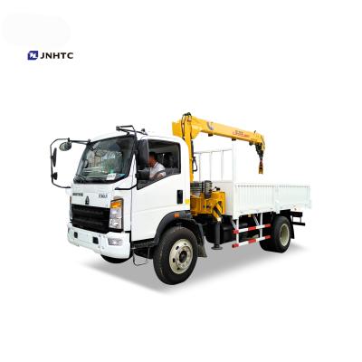 China TRUCK CRANE Sinotruk homan 4x2 6wheels crane 3 ton cargo truck with 12ton crane for sale