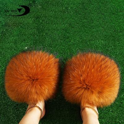 China Fashion Trend Wholesale Price Luxurious Fast Shipping Women Brown Raccoon Fur Slippers Real Fur Slippers for sale