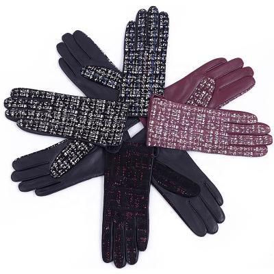 China Simple Women Fashion Winter Wind Proof Embossed Genuine Leather Gloves for sale