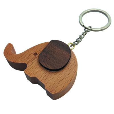 China Eco-Freindly Elephant Shape Best Price Custom Color Cute Painting Wooden Key Chain for sale