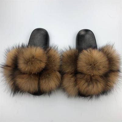 China High Quality Logo Fashion Trend Fur Slippers Black And White Fur Slides Real Fur Slides for sale