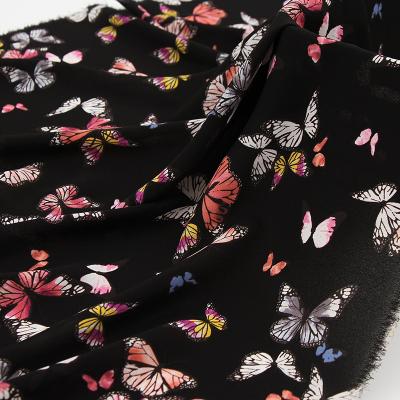 China Simple black fashion colorful butterfly pattern printed chiffon fabric for dress, skirts, shirts by the meter for sale