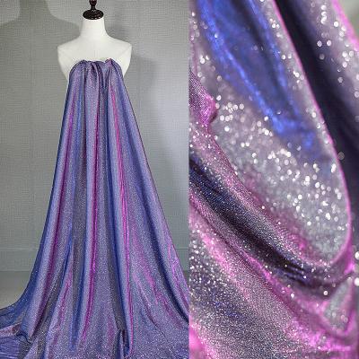 China Premium Purple Tulle Fabric Glitter Stretch Sparkle Stretch W/Silver Reflective Laser Sold By The Yard for sale