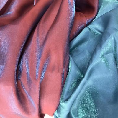 China Other fashion soft blue glitter satin fabric for dress skirt, black, red, grey, and yellow, green, by the meter for sale