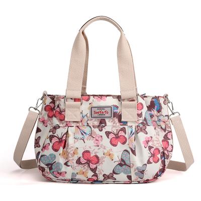 China Universal Floral Satchel Handbag Elegant Light Weight Tote Water Resistant Slanted Shoulder Bag Women's Tote Bag for sale