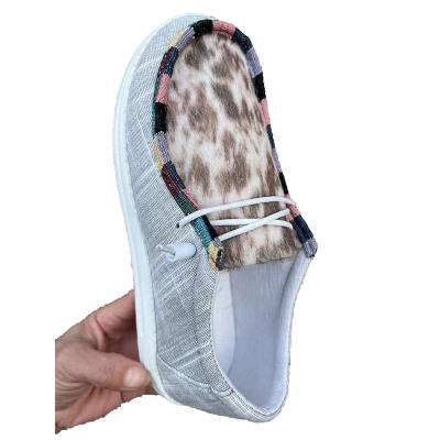 China Other New Lace Cowhide Casual Shoes Scare Printing Canvas Shoes For Women for sale