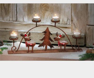 China Creative Christmas Reindeer Candlestick Metal Christmas Reindeer Candlestick Iron 4 Tea Candle Holder for sale