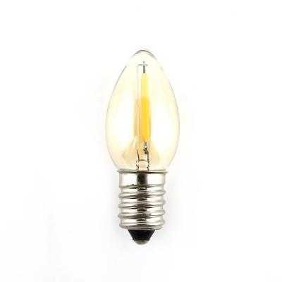 China Clear Gold Led Light Light Amber Led String Lights Xmas Papaya Candle Style Bulb Christmas Lamp C7 E14 for sale