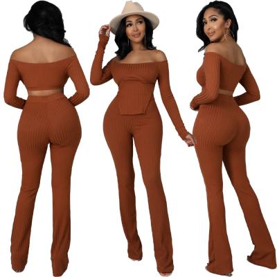 China Breathable X1162C long sleeve solid color drawstring crop tops pants set women's luxury clothing 2021 autumn set women pure two-piece set for sale