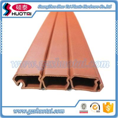 China Plastic Wood Grain 8*45mm Kitchen Cabinet PVC Rolling Shutter for sale