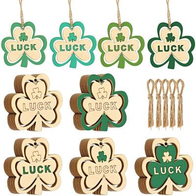 China 10pcs Europe Leaf Hollow Clover DIY Sign Shamrock Wooden Hanging Ornaments Three In Irish Patrick's Day for sale