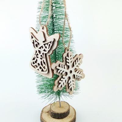 China Europe's newest Christmas decorations hollow out creative wooden crafts for Christmas tree decoration and wedding for sale