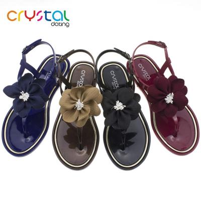 China PVC Ladies T-Shape Flower Flat Sandals for sale