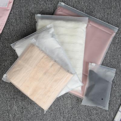 China Wholesale Custom Logo Disposable Matte Frosted Waterproof PE Plastic Slider Zipper Clothes Plastic Package Ziplock Bags for sale