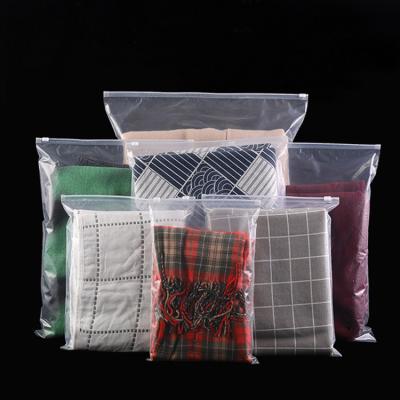 China Customized Disposable Transparent Frosted Ziplock Plastic Socks Clothing Package Bag for sale