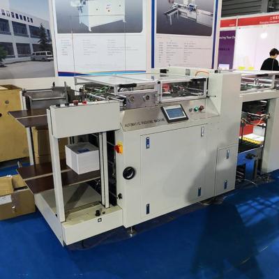 China Automatic high speed paper punching machine for calendar notebook SPB-550 for sale