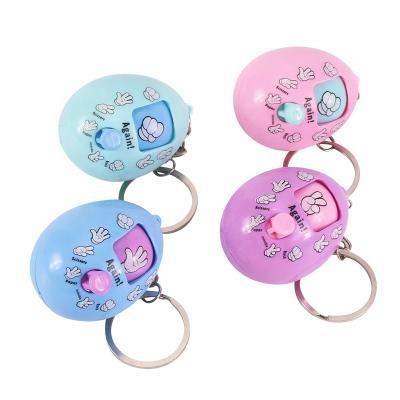 China Classic Toy Classic Finger Guess Game Toy Capsule Key Chain Egg Pocket Guess Paper Toys for sale