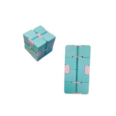 China Portable Funny Four Hand Game Maze Toys Macaron Color Infinity Corner Cube Wiggle Toys For Children for sale