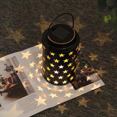 China Design Hollow Metal Pattern Solar Charge Customized Hanging Lantern Led Solar Garden Lamp For Outdoor for sale