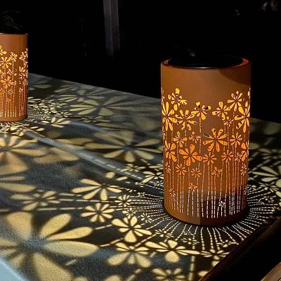 China Solar Charge Outdoor Waterproof Europe Style LED Lantern Solar Table Light Iron Metal Hollow Carved Pattern Brown Black Lamp With Handle for sale