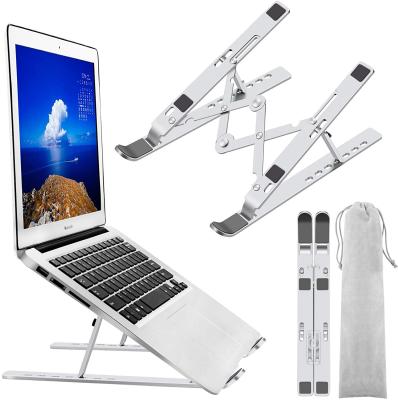 China 7-15.6 Inch Ergonomic Adjustable Height Aluminum Foldable Laptop Stand Portable Desk for sale