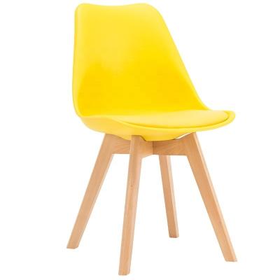 China Affordable Modern Nordic Classic Design PP Yellow Plastic Restaurant Cafe Dining Chair With Wooden Leg for sale